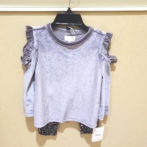 BCBGirls 12M 2 piece shoulderout silver shirt w/black tights with star print.